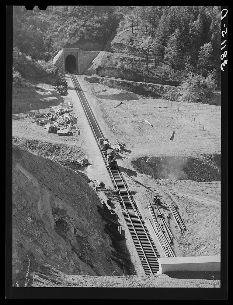 Many miles of the Southern Pacific railroad had to be enrouted and new tunnels and track constructed to take care of…