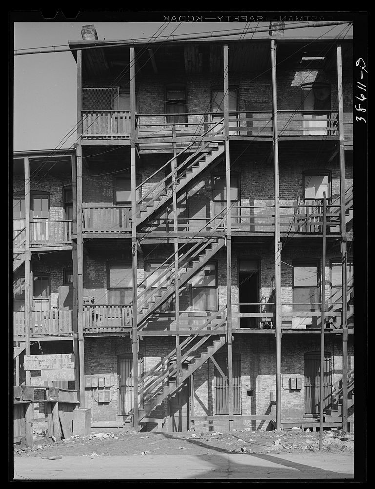 Back of apartment house rented to African Americans. Southside of Chicago, Illinois by Russell Lee