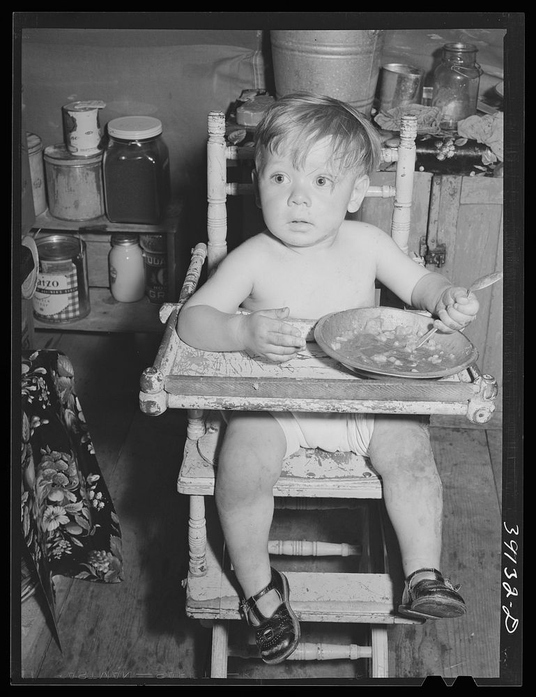 Child. FSA (Farm Security Administration) migratory labor camp mobile unit. Wilder, Idaho by Russell Lee