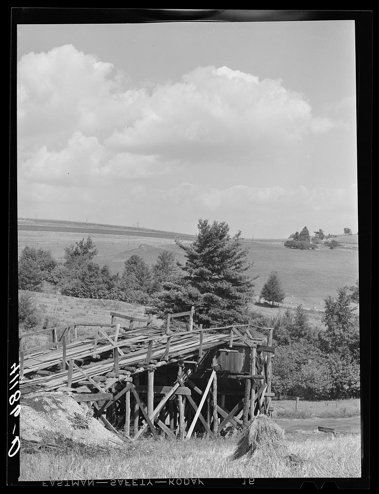 Landscape from Britton farm near Falls Creek, Pennsylvania, showing coal tipple and farm land in background. Sourced from…