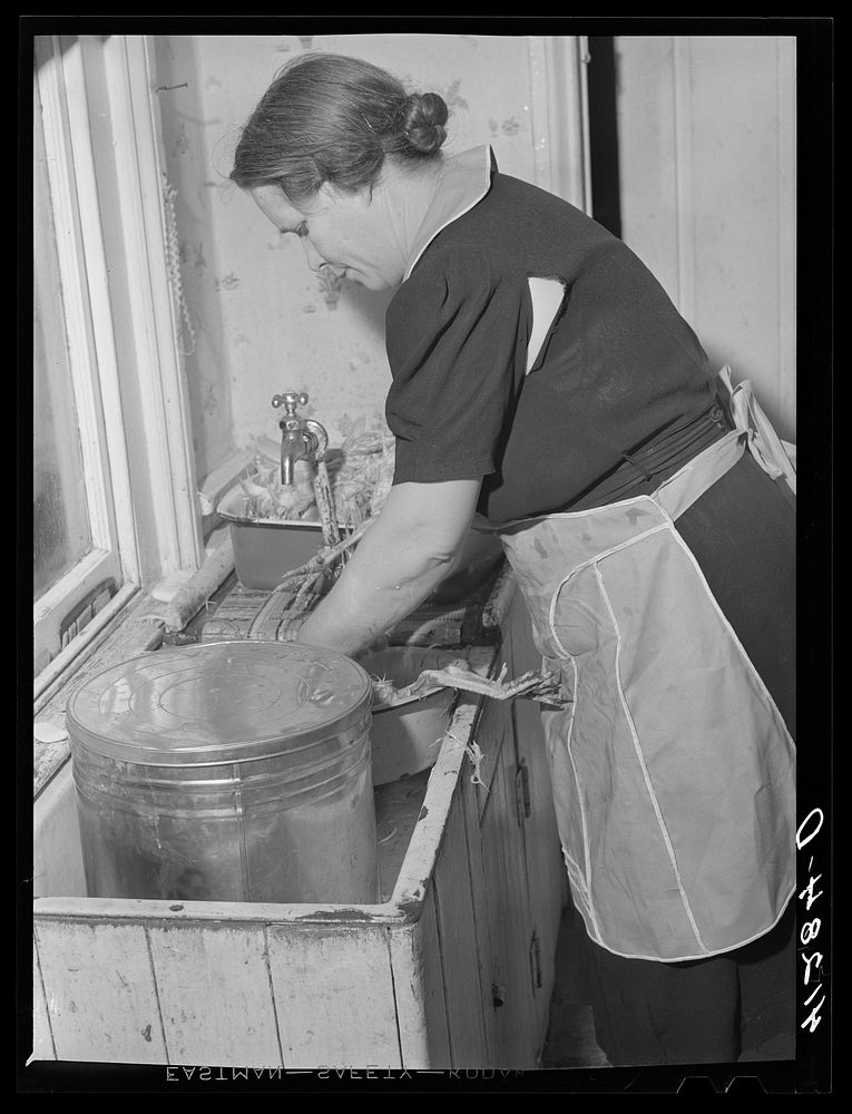 Mr. Ralph Reitz, member of the Tri-County Co-op Market at Du Bois, Pennsylvania, preparing baked goods for market at her…