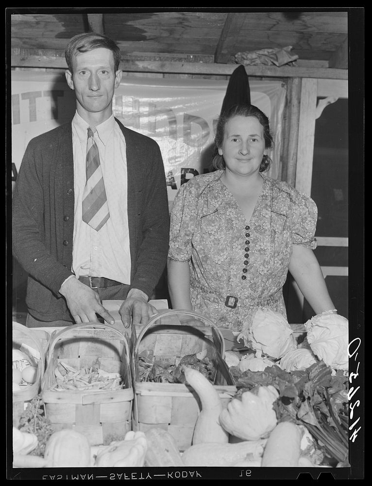 Mr. and Mrs. Bundy at their booth at the Tri-County Farmers Co-op Market at Du Bois, Pennsylvania. Sourced from the Library…