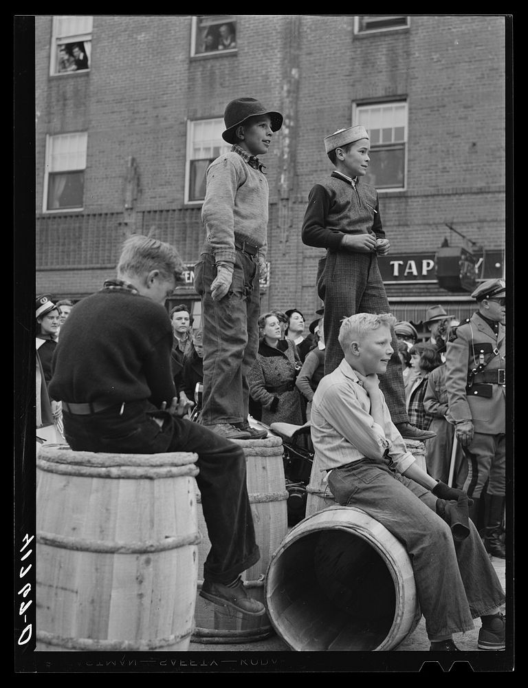 Youngsters watching the men's race at the barrel rolling contest in Presque Isle, Maine. Sourced from the Library of…