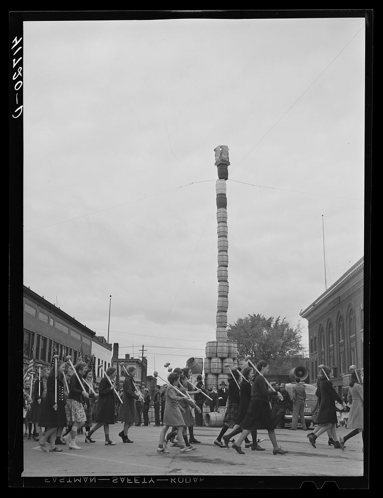 [Untitled photo, possibly related to: The "Pototem pole" standing in the main street of Presque Isle as an advertising stunt…