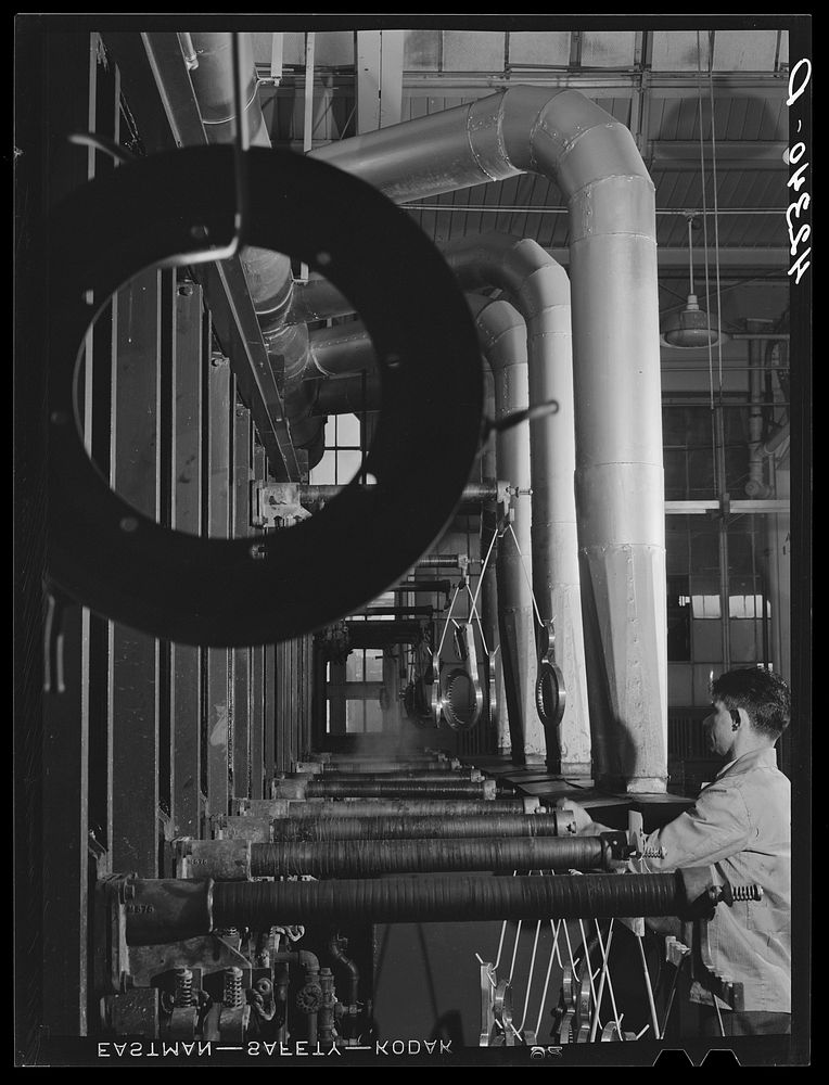 New type of plating machine being used at the Hamilton Standard Propeller Corporation. It automatically dips the part into…