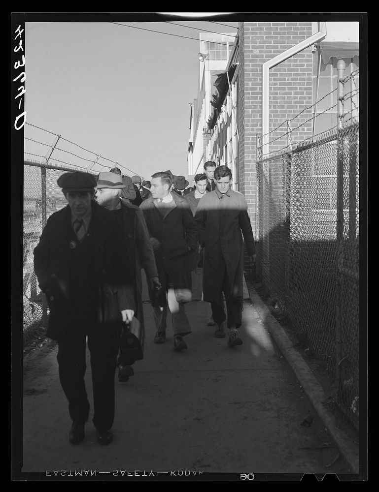 [Untitled photo, possibly related to: Workmen leaving the plant at Vought Sikorsky Aircraft Corporation. Stratford…