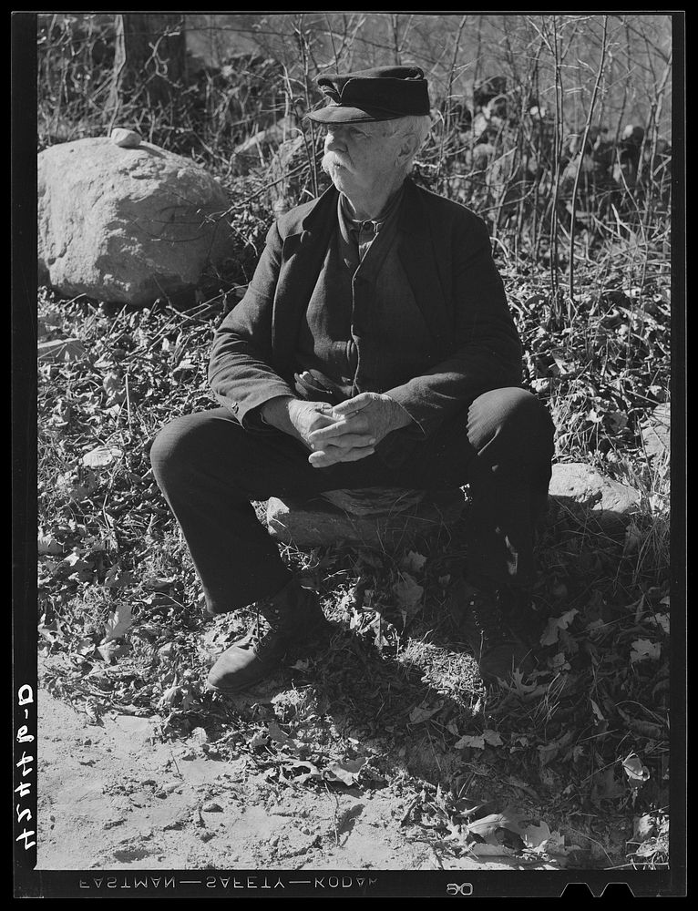 [Untitled photo, possibly related to: Jim Grey, retired old farmer of Ledyard, Connecticut, waiting for the noon mail at the…