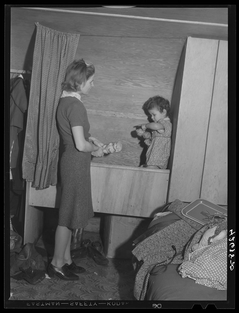 [Untitled photo, possibly related to: Mrs. Robert R. Reynolds and her little girl. Mr. Reynolds works at the Bath Iron…