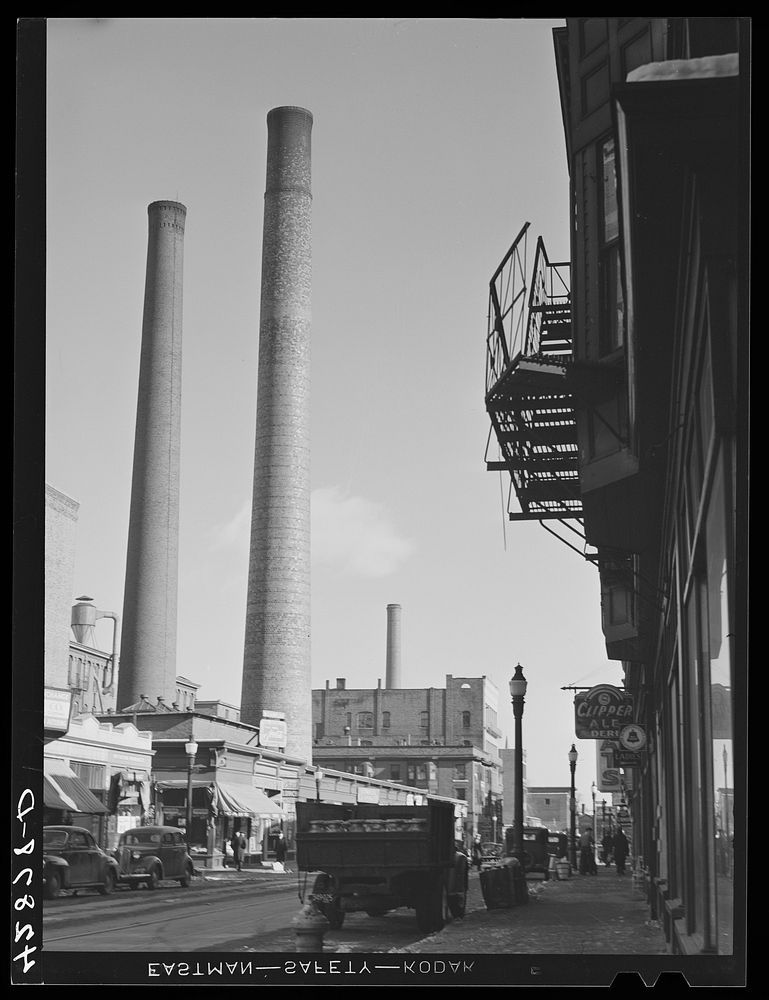 [Untitled photo, possibly related to: A street in Lowell, Massachusetts]. Sourced from the Library of Congress.