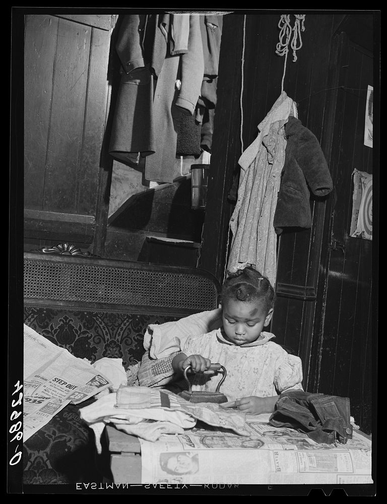 Child of a  family living in slum area of New Brighton, Pennsylvania. Sourced from the Library of Congress.