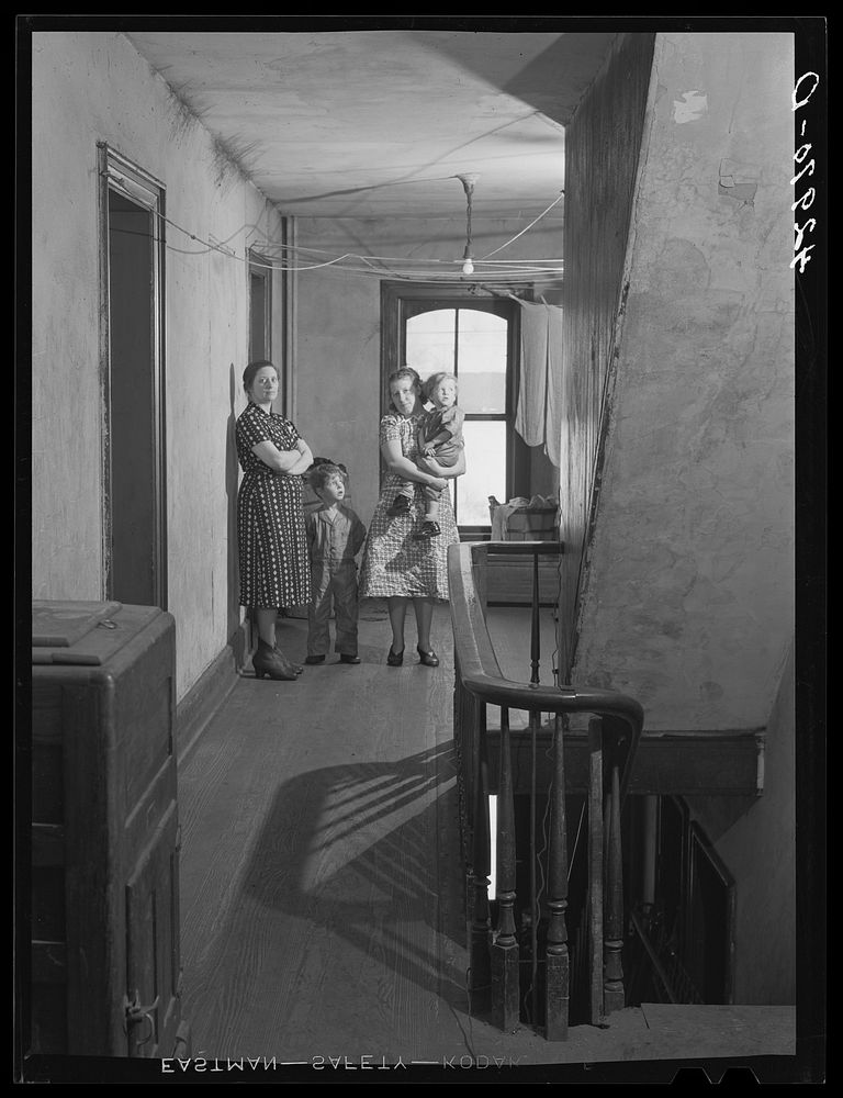 Tenants living in the crackerbox. Slum tenement in Beaver Falls, Pennsylvania. Sourced from the Library of Congress.