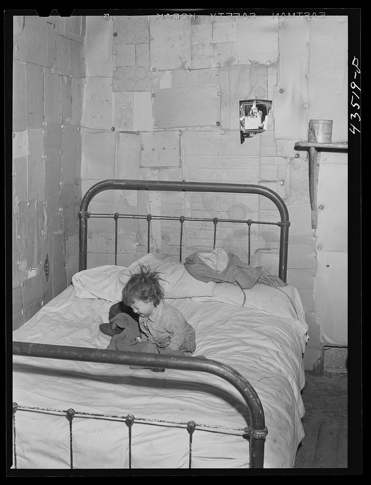 [Untitled photo, possibly related to: In the home of a "squatter" family that was preparing to move off the Camp Croft area.…