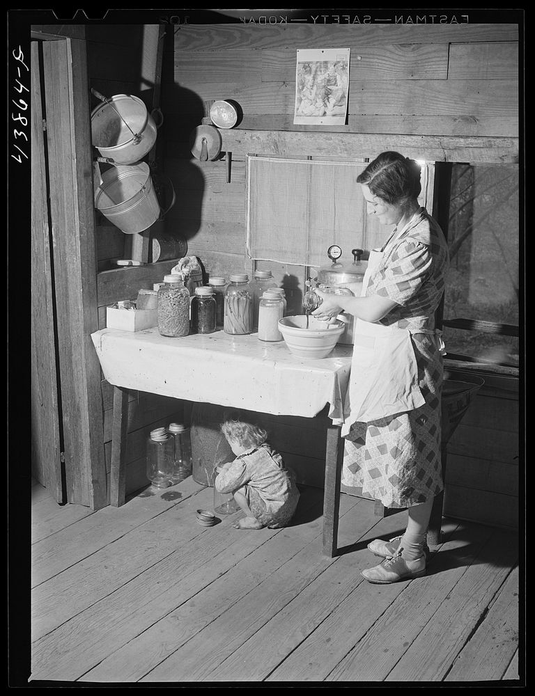 [Untitled photo, possibly related to: Mrs. L. Smith still has some canned goods left over from the winter. Carroll County…