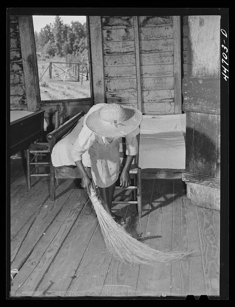 Daughter of Mr. Frank Champion, FSA (Farm Security Administration) borrower, sweeping up. Near White Plains, Greene County…