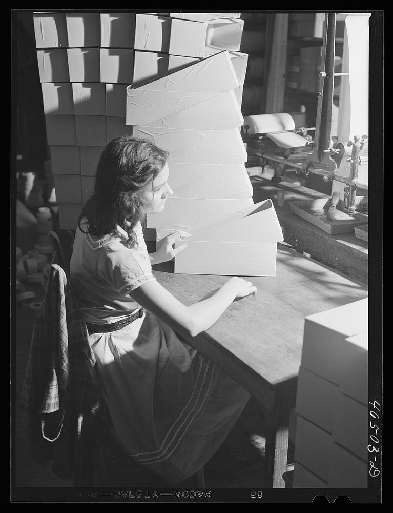 [Untitled photo, possibly related to: Making boxes to pack socks in the textile mill in Union Point, Greene County…