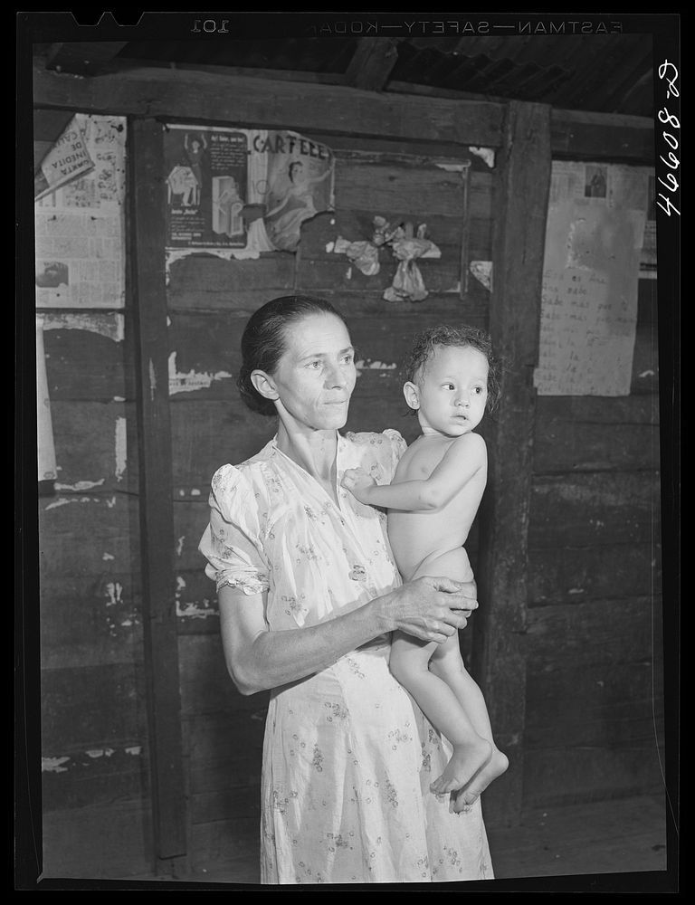 Manati, Puerto Rico (vicinity). Wife and child of a FSA (Farm Security Administration) borrower. Sourced from the Library of…