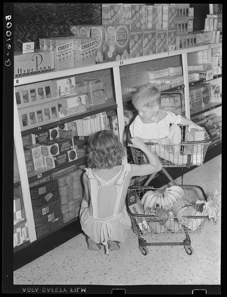 Children buying groceries in co-op store. Greenbelt, Maryland. Sourced from the Library of Congress.