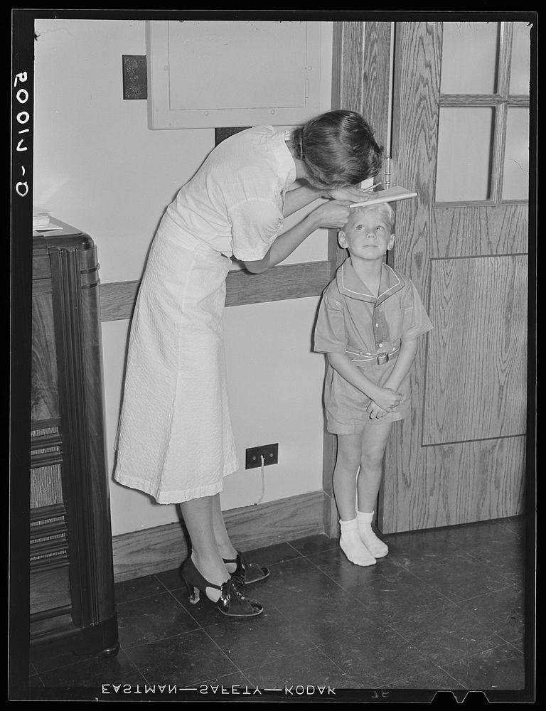 Preschool examination and check up. Greenbelt, Maryland. Sourced from the Library of Congress.