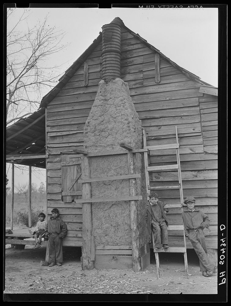 Mud chimney on home of Indian (mixed breed--"brass ankles") family near Summerville, South Carolina. Sourced from the…