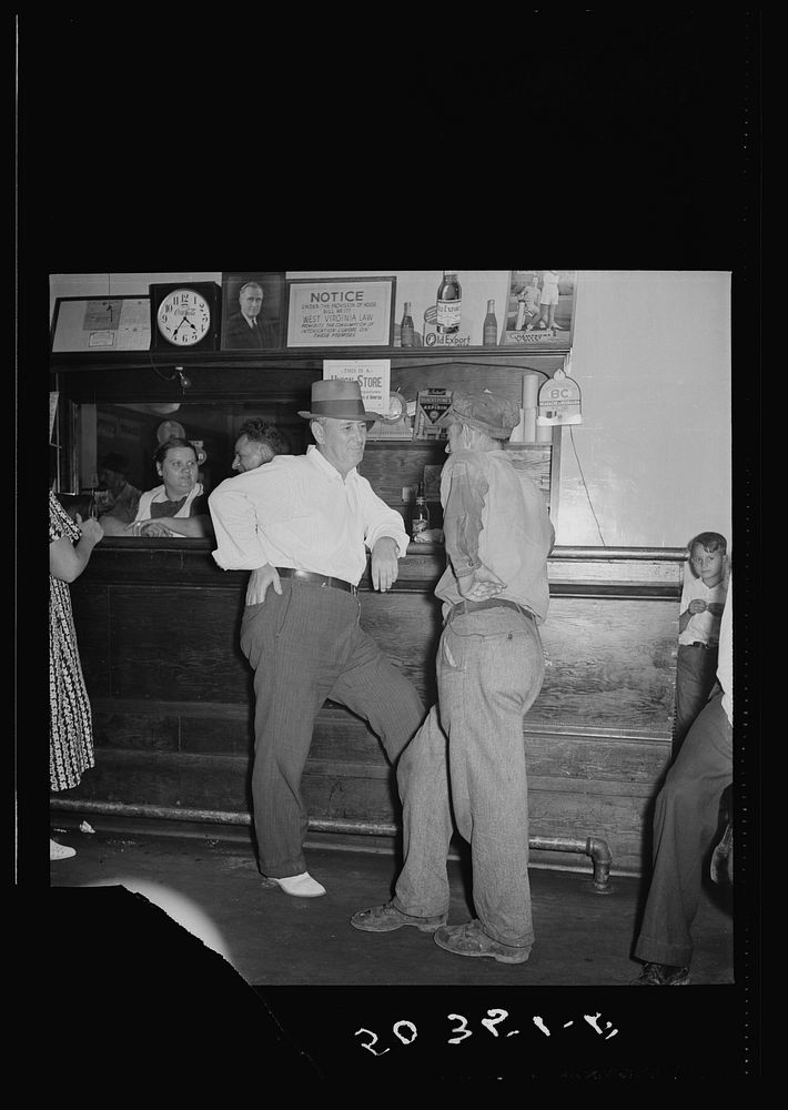Miners at a bar drinking beer. Osage, West Virginia. Sourced from the Library of Congress.