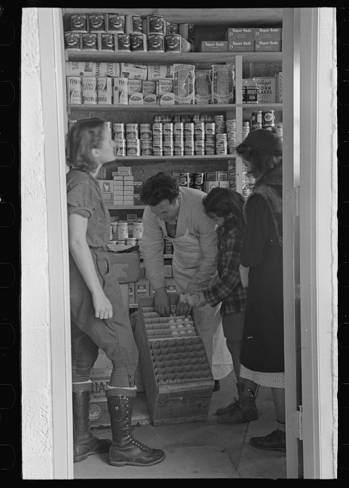 [Untitled photo, possibly related to: Scene in the first cooperative store in Jersey Homesteads run by Nathan Dubin…