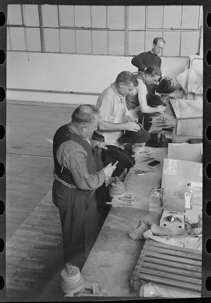 [Untitled photo, possibly related to: Making hats in the cooperative garment factory at Jersey Homesteads, Hightstown, New…