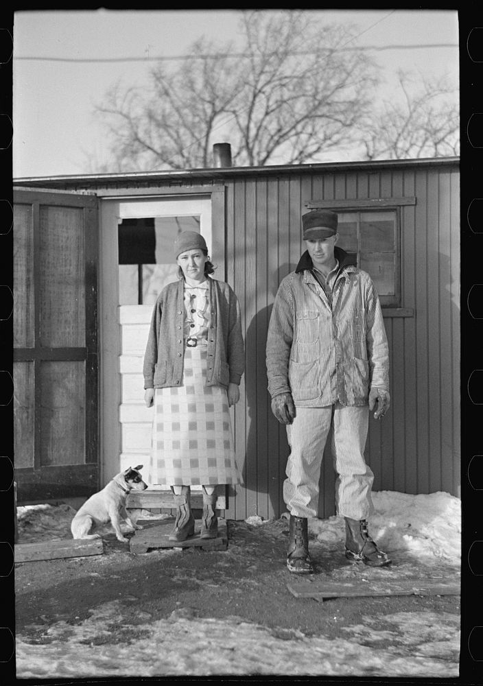 Mr. and Mrs. Marcus Miller and dog, Spencer, Iowa by Russell Lee