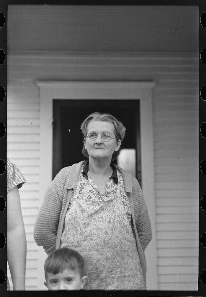 Mrs. Theodore F. Frank, wife of a formerly prosperous farm owner. The farm is now owned by a loan company and the family is…