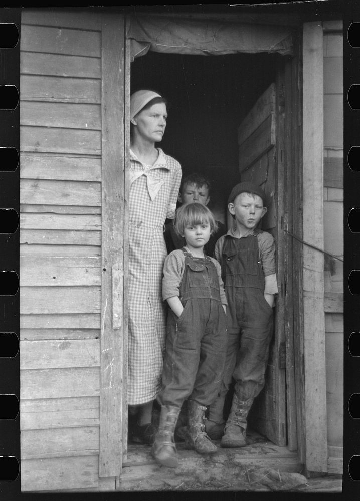Mrs. Frank Moody with two of her seven children on their eighty acre farm in Miller Township, Woodbury County, Iowa by…