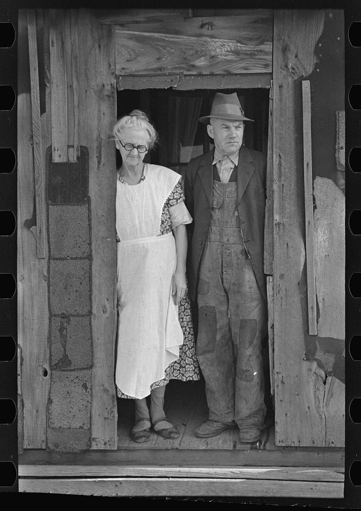 Mr. and Mrs. John Landers, tenant farmers, at the backdoor of their farmhouse, near Marseilles, Illinois by Russell Lee
