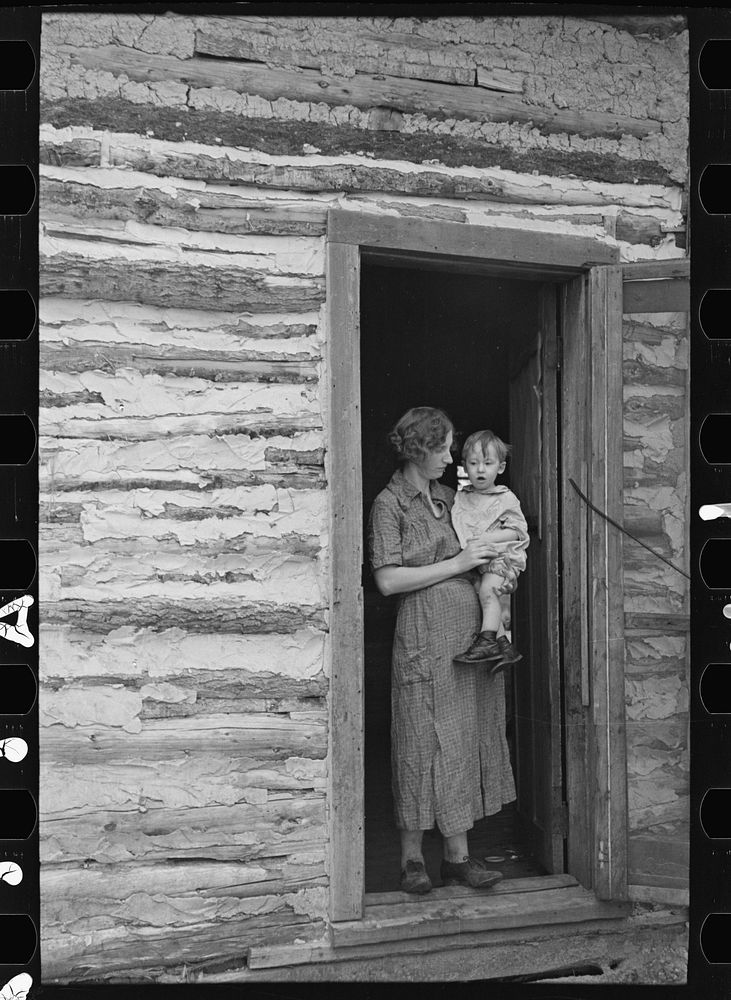 Mrs. Donald Heath and baby, near Black River Falls, Wisconsin by Russell Lee