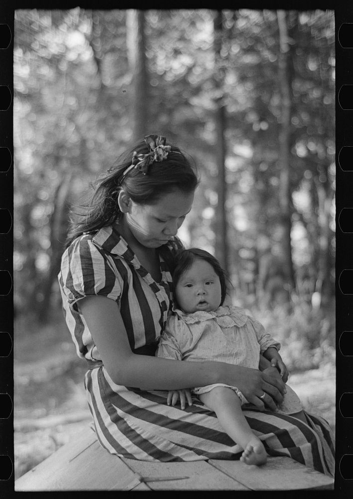 [Untitled photo, possibly related to: Young Indian mother and baby, blueberry camp, near Little Fork, Minnesota] by Russell…