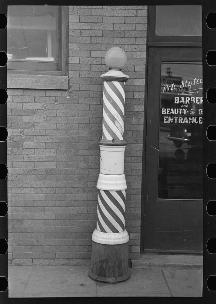 Barber pole. Williston, North Dakota by Russell Lee