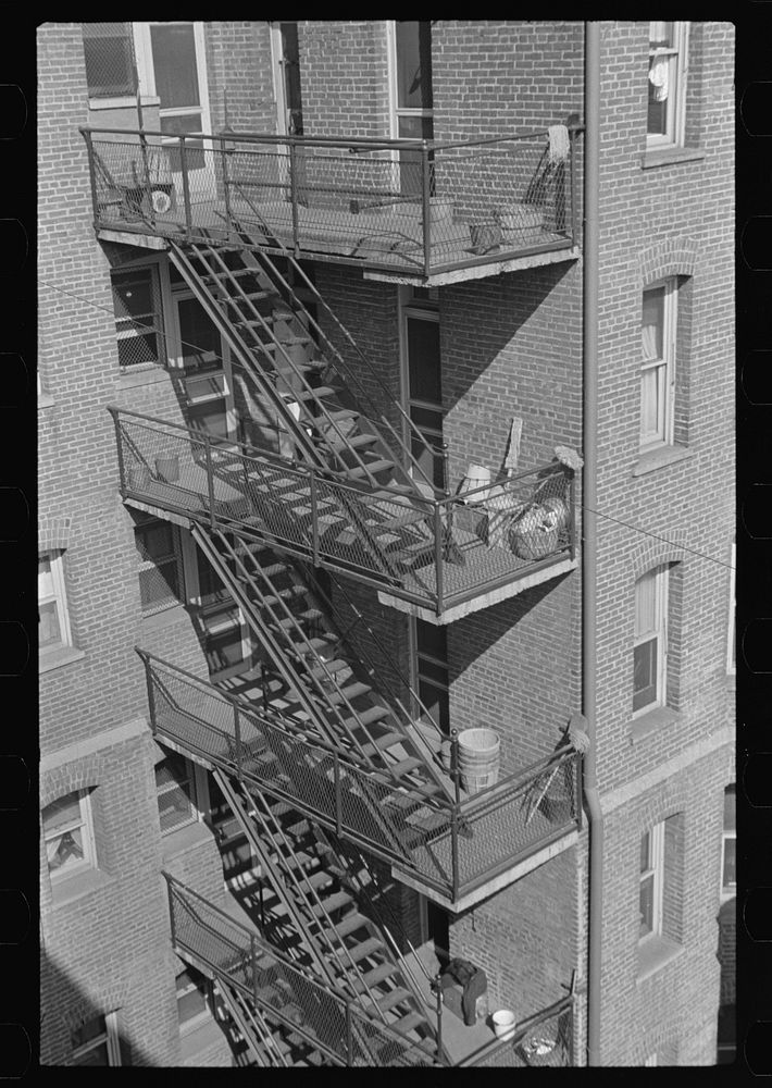 [Untitled photo, possibly related to: Rear stairs of apartment house, L Street, N.W., Washington, D.C.] by Russell Lee