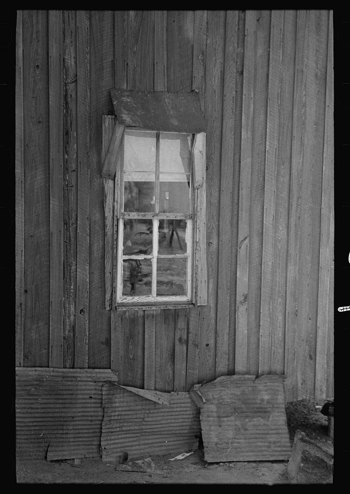 [Untitled photo, possibly related to: Front porch of sharecropper cabin, Southeast Missouri Farms] by Russell Lee