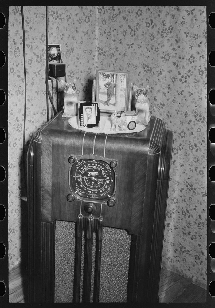 Radio with ornaments and decorations in home of FSA (Farm Security Administration) client near Caruthersville, Missouri by…