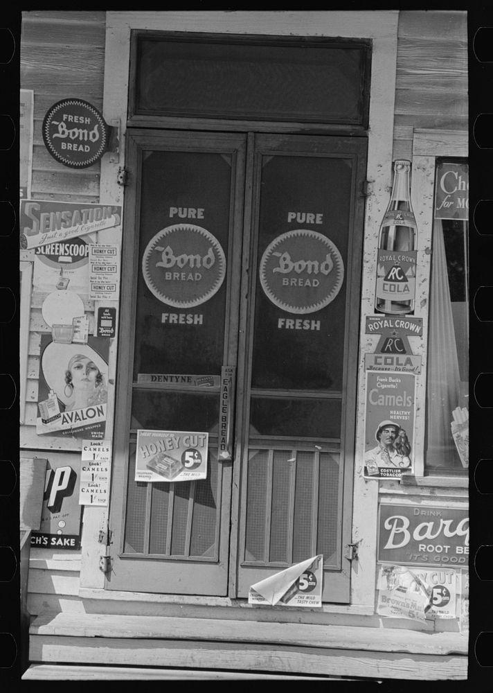 Entrance to store, Kenner, Louisiana by Russell Lee