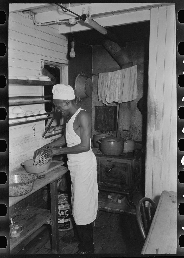 [Untitled photo, possibly related to: Cook of El Rito in galley of packet boat on lower Mississippi River] by Russell Lee