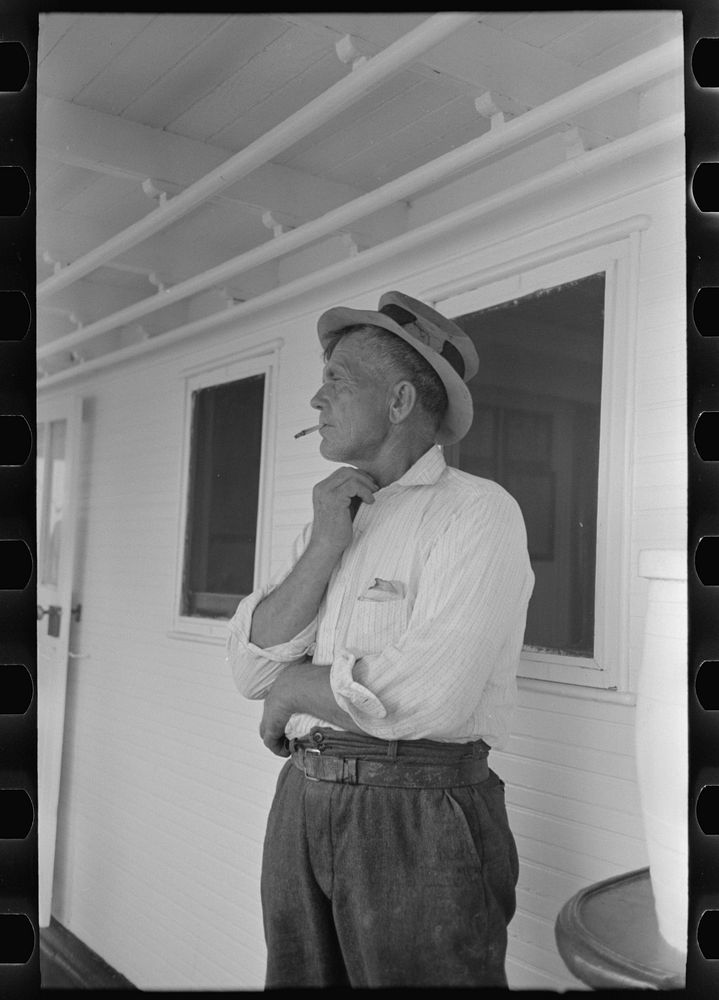 [Untitled photo, possibly related to: Oyster fisherman of Olga, Louisiana, aboard El Rito. Captain of this boat gives free…