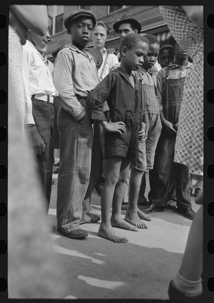 Boys in crowd, National Rice Festival, Crowley, Louisiana by Russell Lee