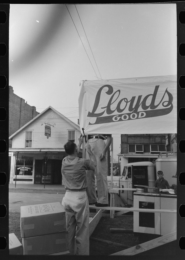 [Untitled photo, possibly related to: Unloading bottled drinks from truck, National Rice Festival, Crowley, Louisiana] by…