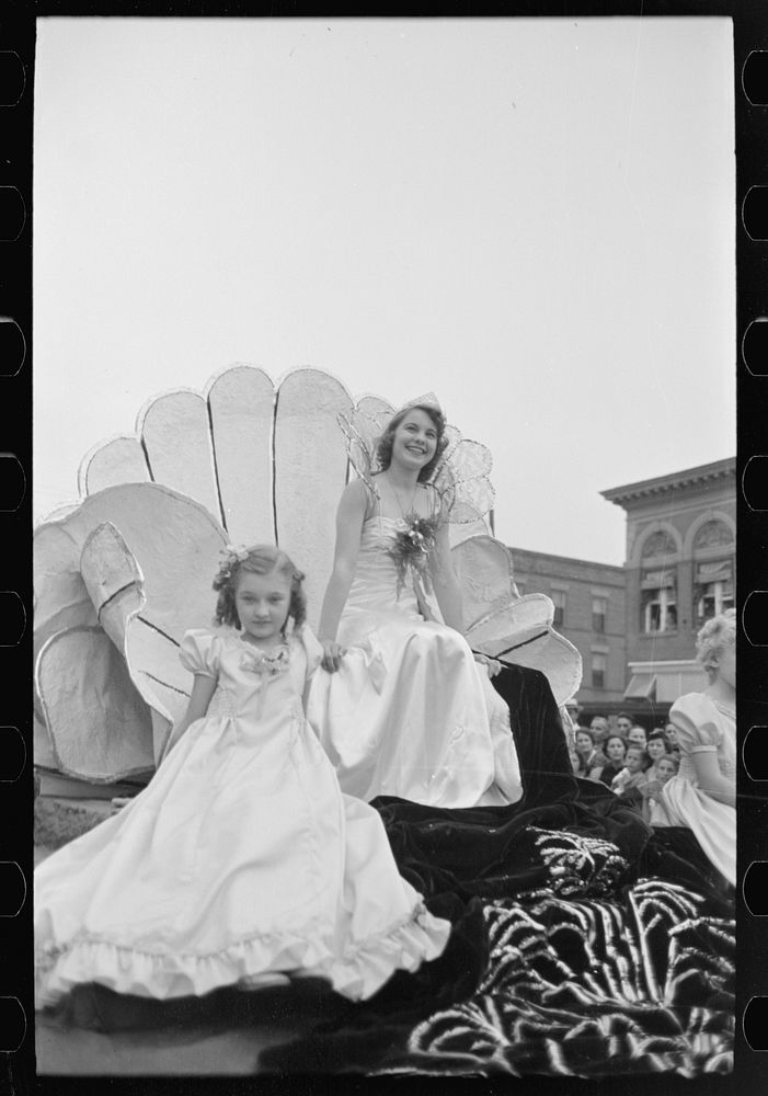 Queen and attendant on float, National Rice Festival, Crowley, Louisiana by Russell Lee