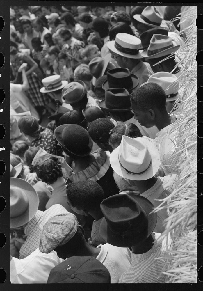 [Untitled photo, possibly related to: Detail of crowd watching street dance, National Rice Festival, Crowley, Louisiana] by…