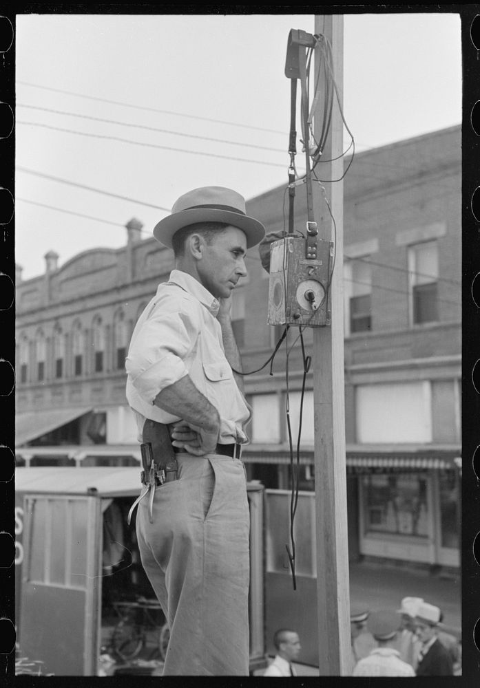 Testing public address system, National Rice Festival, Crowley, Louisiana by Russell Lee
