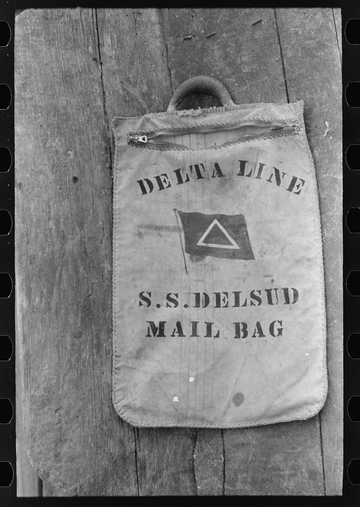 Mail bag on dock, Pilottown, Louisiana by Russell Lee