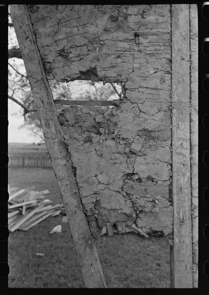 [Untitled photo, possibly related to: Detail of construction of old house; note the wooden cross lath. The construction…