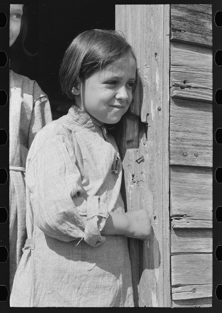 Daughter of sugarcane laborer, near New Iberia, Louisiana by Russell Lee