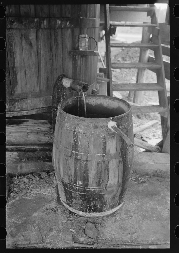Distillate from turpentine still separates into two layers of water and spirits of turpentine which are easily removed from…