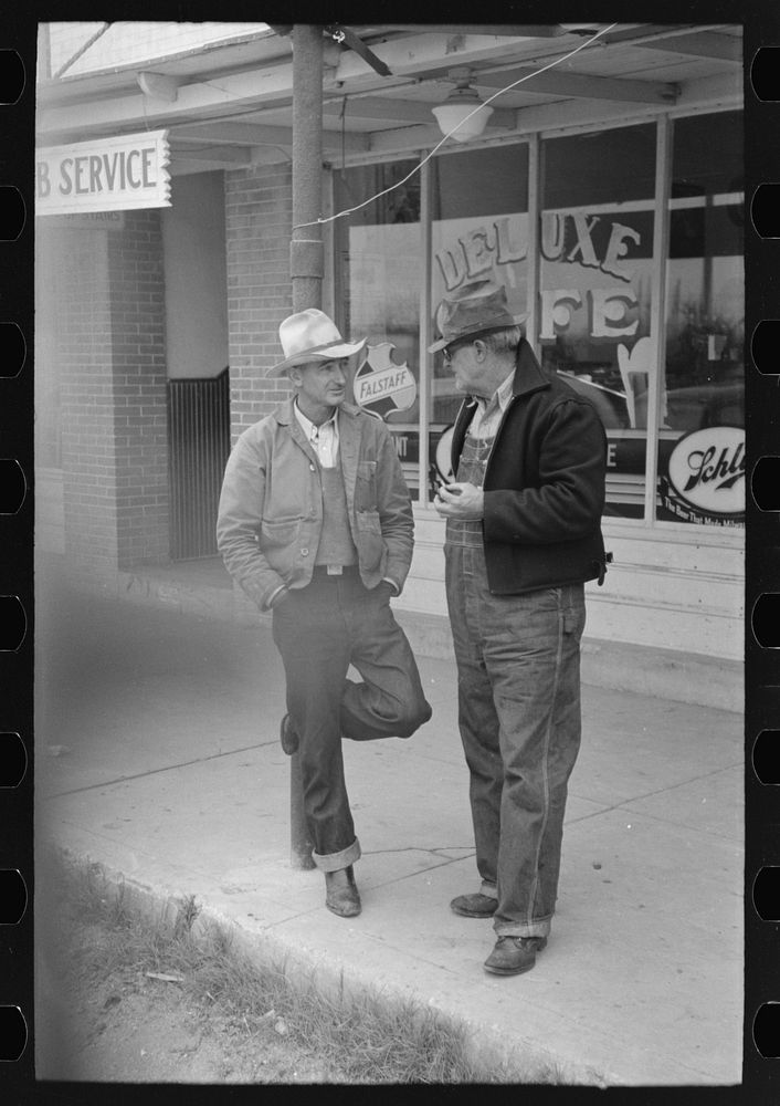 Men talking sidewalks Sinton, Texas | Free Photo - rawpixel