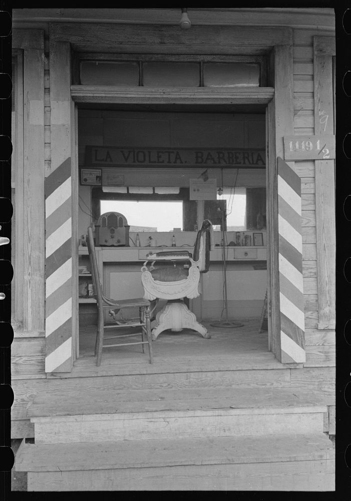 [Untitled photo, possibly related to: Barbershop, San Antonio, Texas, Mexican section] by Russell Lee